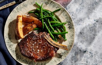 Dry-Aged Rib Steak with Fried Potato Wedges and String Beans